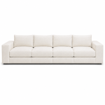 Modern cream sectional sofa with chaise lounge, layered arm design, and contemporary luxury style in elegant living room.